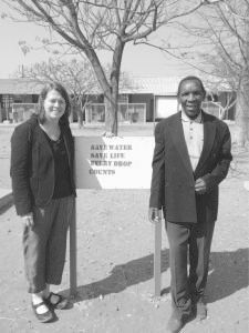 Visiting her old school in Botswana with the former head Sam Ruhube.