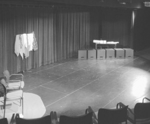 This is the typical setup for a Playback performance, and part of the ritual for Playback Theatre. Setting includes seating for the conductor (or MC), teller (an audience member), actors, and scarves and musical instruments/noisemakers.