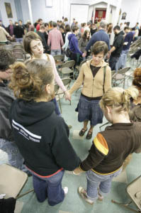 Circle of Hope members praying together. Photo courtesy of Circle of Hope.