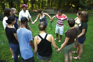QVS Volunteers playing a game during orientation.