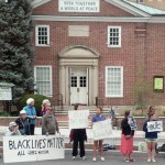 Friends gather for weekly peace vigil in front of Homewood Meeting in Baltimore, Md.