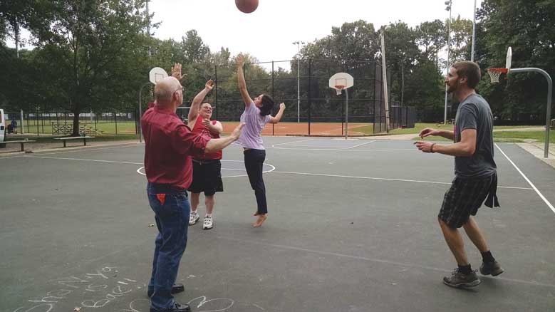 L'Arche Atlanta crew playing basketball.