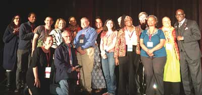 The members of the local host team on stage with Eddie Moore at WPC17.