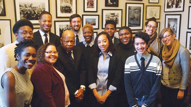 Gabby Hammons (center, with short hair) next to Congressman John Lewis during FCNL's Spring Lobby Weekend, 2016.