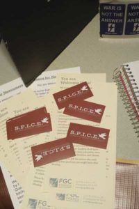 SPICE Quaker Student Community, a campus ministry at Appalachian State University, hands out stickers to interested students with their meeting time written on the back.