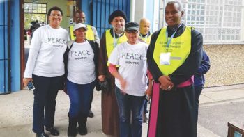 Leadings of the Spirit Peace monitors with Thabo Makgoba (on right), the Anglican archbishop of Cape Town. Photos courtesy of the authors.