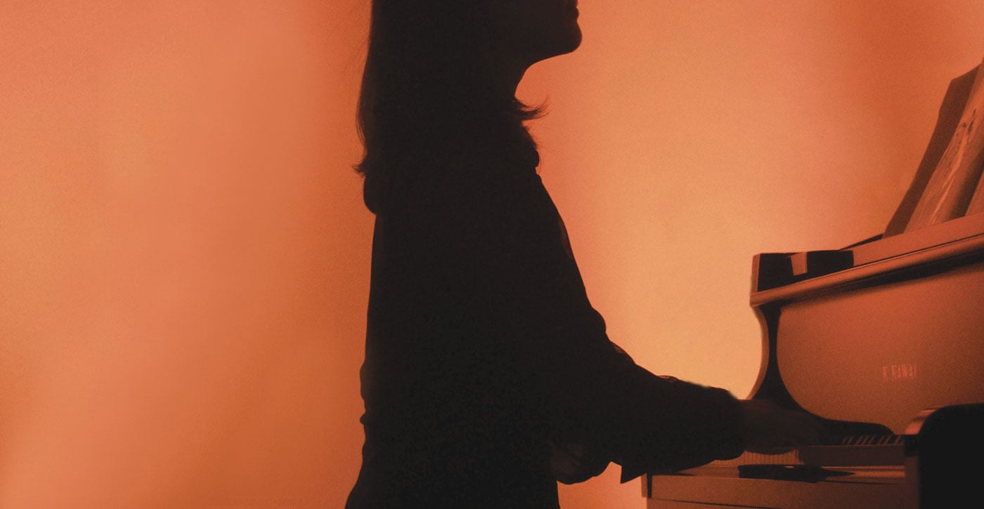 Woman on the Piano